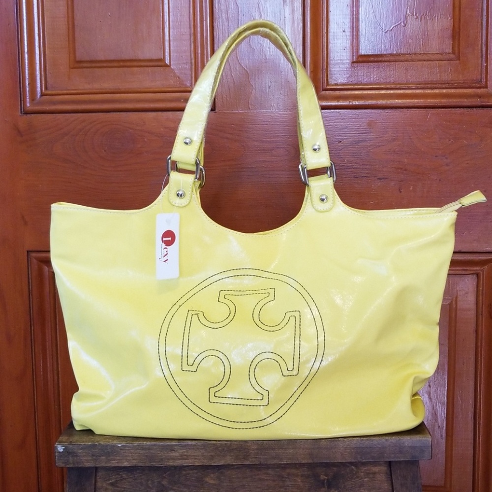 IRON CROSS TOTE. I N T E R N A T I O N A L . I N C